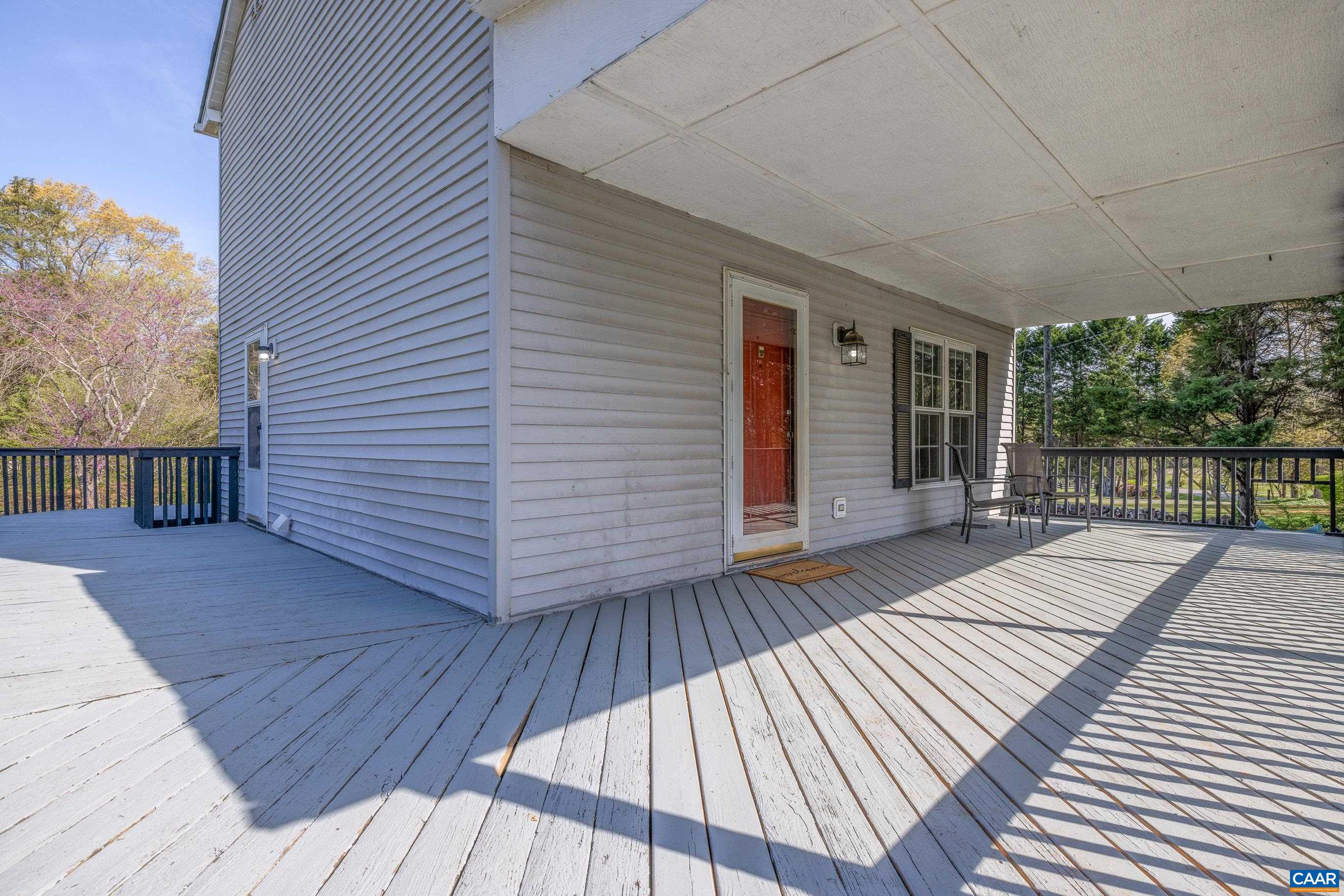 6183 Spring Hill Road Ruckersville, VA 22968 - Photo 15 of 31 a balcony with wooden floor