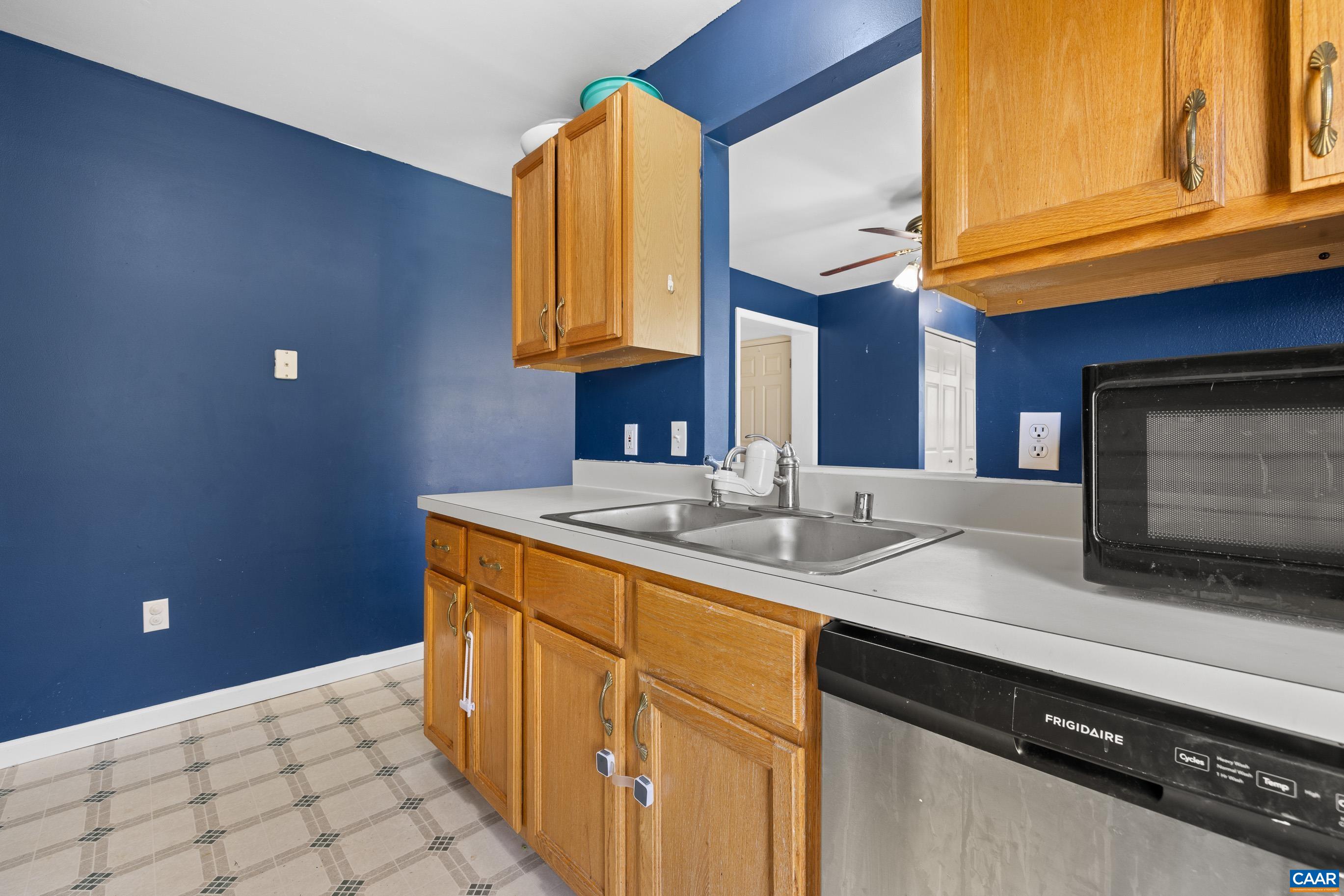 6183 Spring Hill Road Ruckersville, VA 22968 - Photo 23 of 31 a kitchen with a sink and a cabinets