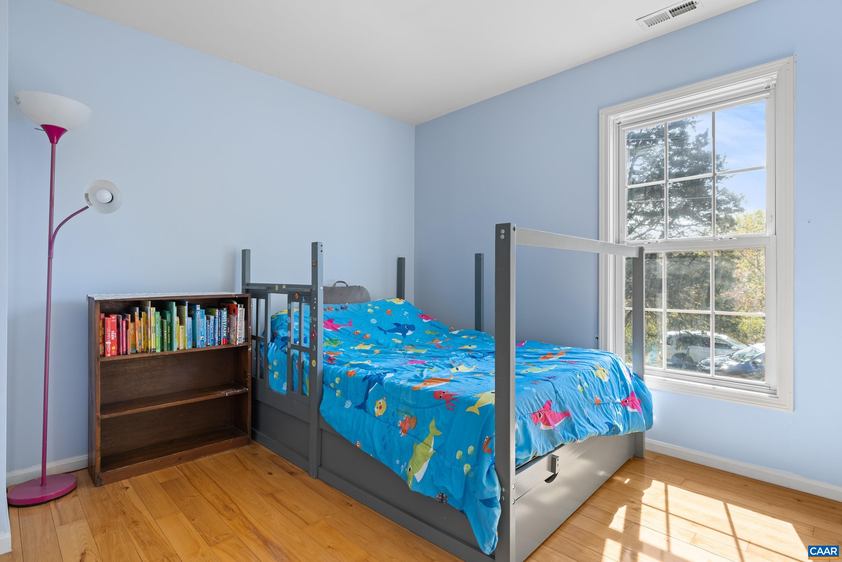 6183 Spring Hill Road Ruckersville, VA 22968 - Photo 28 of 31 a bedroom with bed and a window