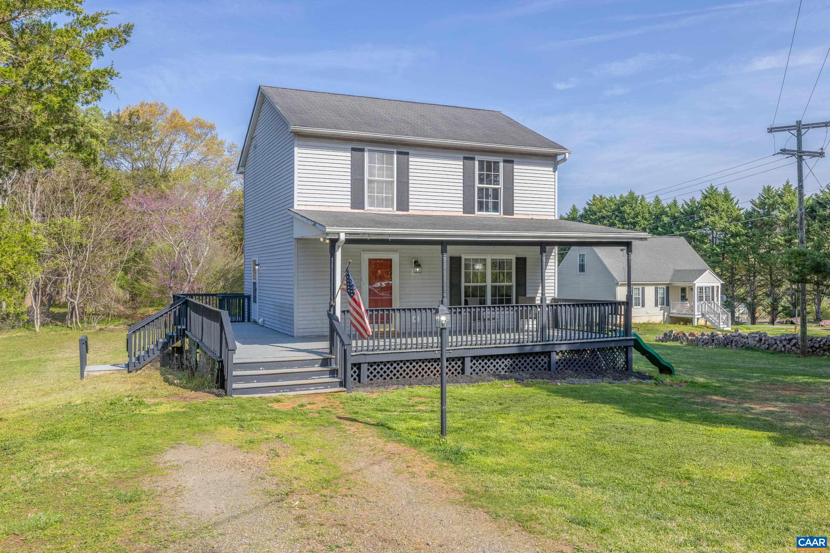 6183 Spring Hill Road Ruckersville, VA 22968 - Photo 9 of 31 front view of a house with a yard