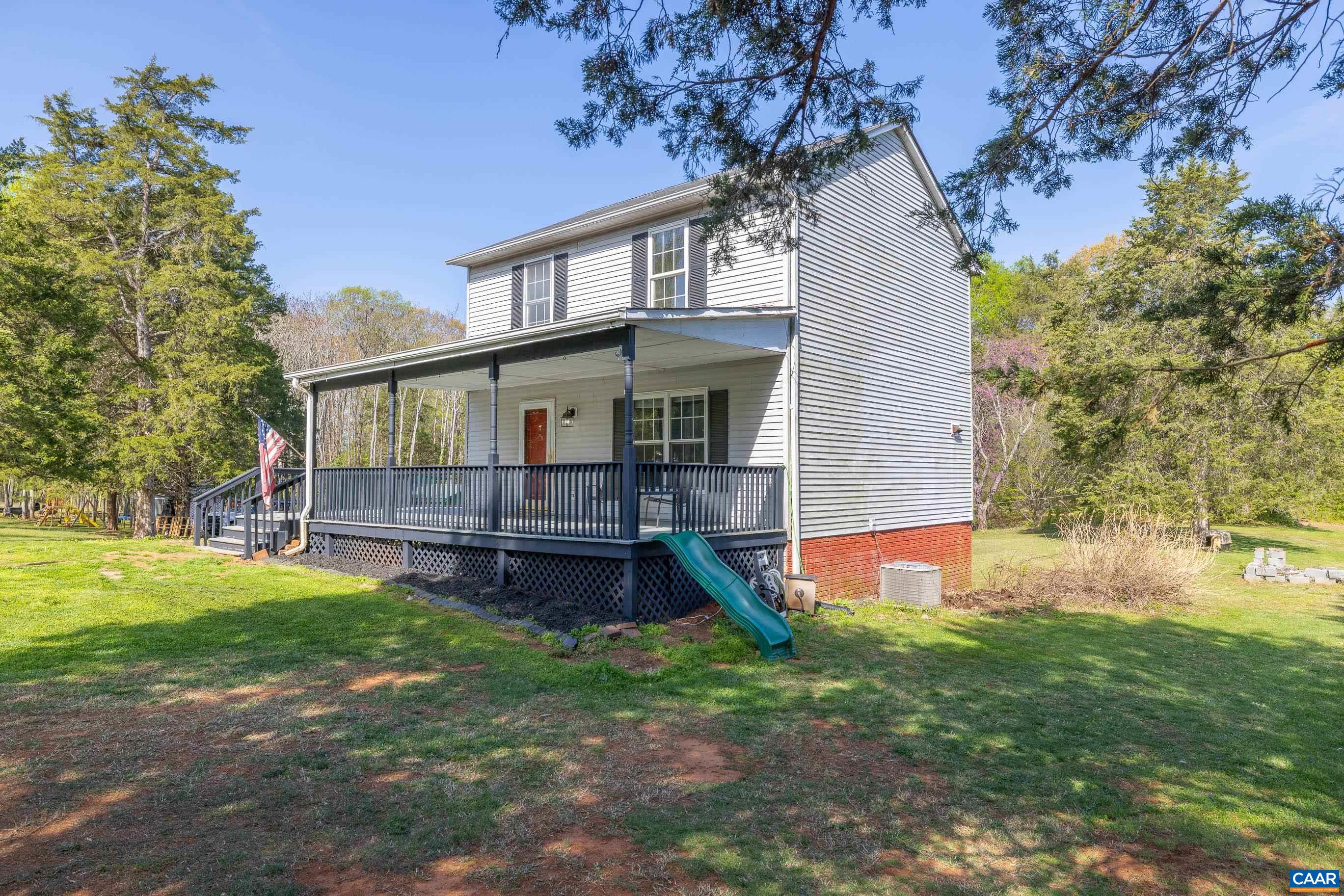 6183 Spring Hill Road Ruckersville, VA 22968 - Photo 10 of 31 a view of house with a backyard