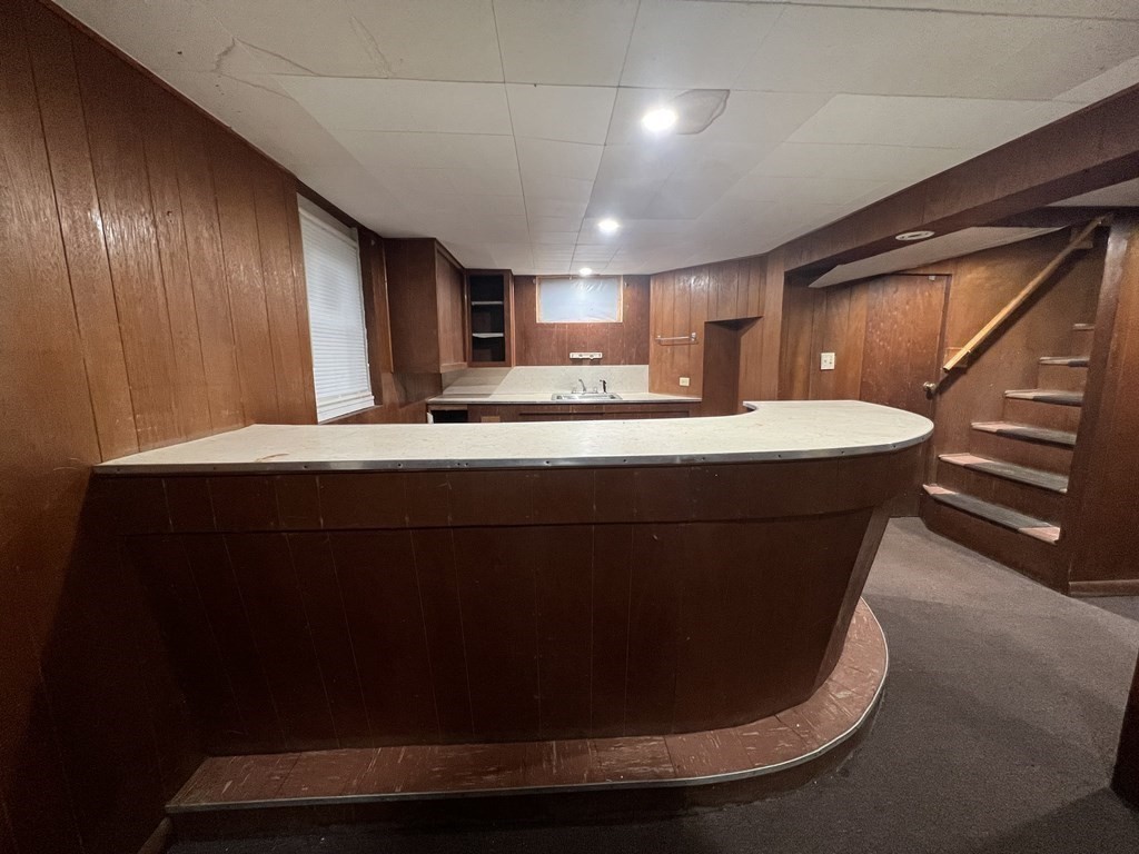 52 Chestnut Street Rehoboth, MA 02769 - Photo 13 of 16 a room with kitchen island stainless steel appliances sink and wooden floor
