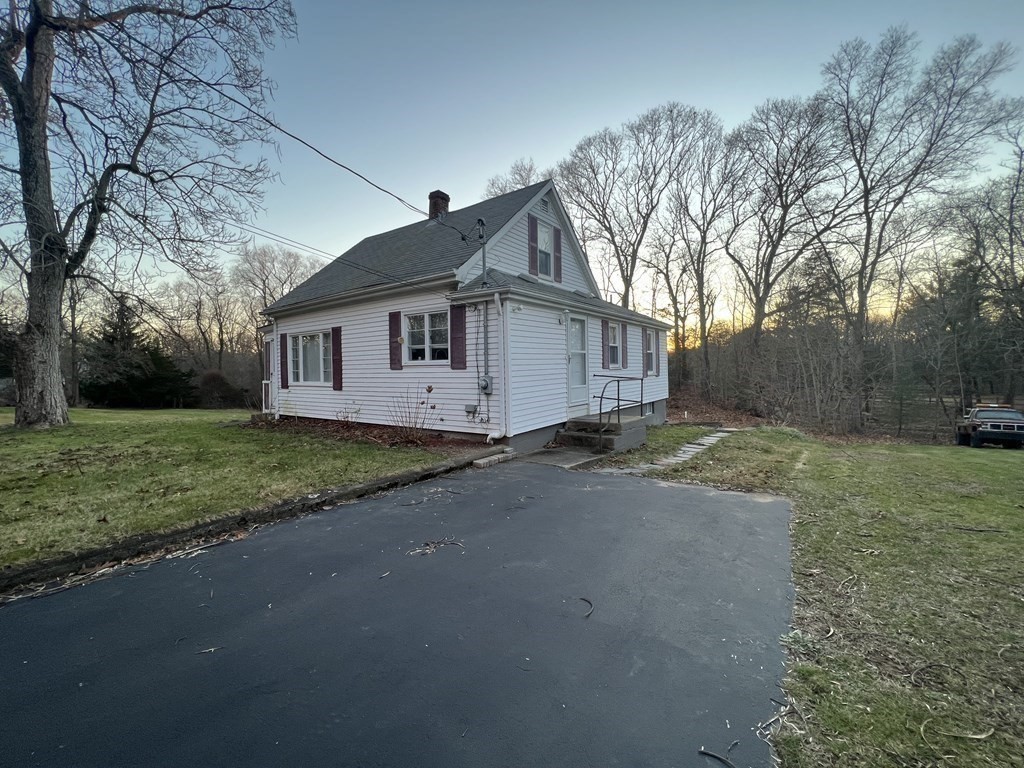 52 Chestnut Street Rehoboth, MA 02769 - Photo 3 of 16 a view of a house with a yard