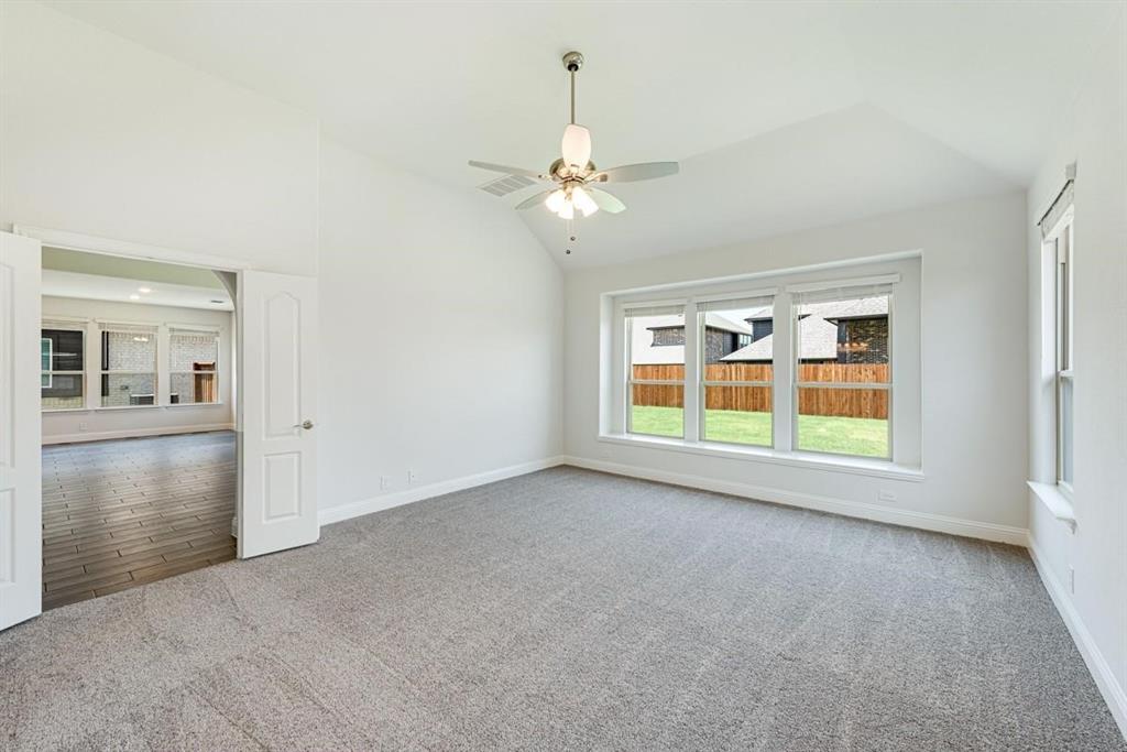 2133 Devonblue Drive Forney, TX 75126 - Photo 19 of 34 a view of an empty room with a window