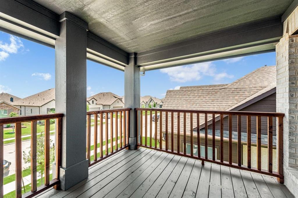 2133 Devonblue Drive Forney, TX 75126 - Photo 25 of 34 a view of balcony with wooden floor