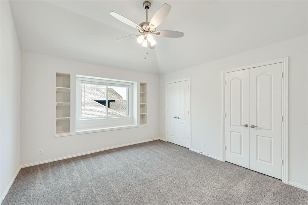 2133 Devonblue Drive Forney, TX 75126 - Photo 30 of 34 a view of an empty room with a window