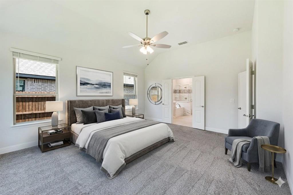 2133 Devonblue Drive Forney, TX 75126 - Photo 4 of 34 a bedroom with bed and a chandelier