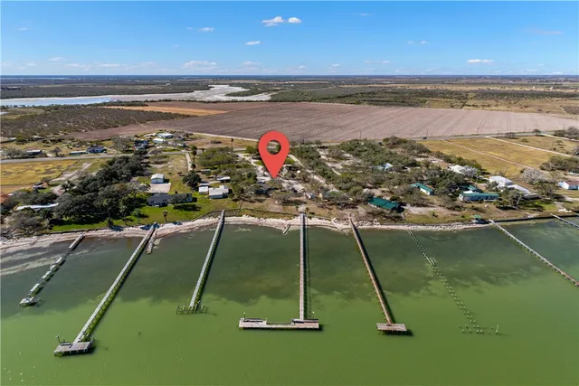 swimming pool view with a lake view