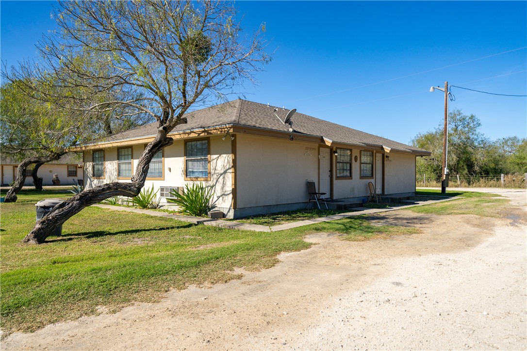 990 East Farm To Market 628 Riviera, TX 78379 - Photo 14 of 39 a view of a house with backyard and trees