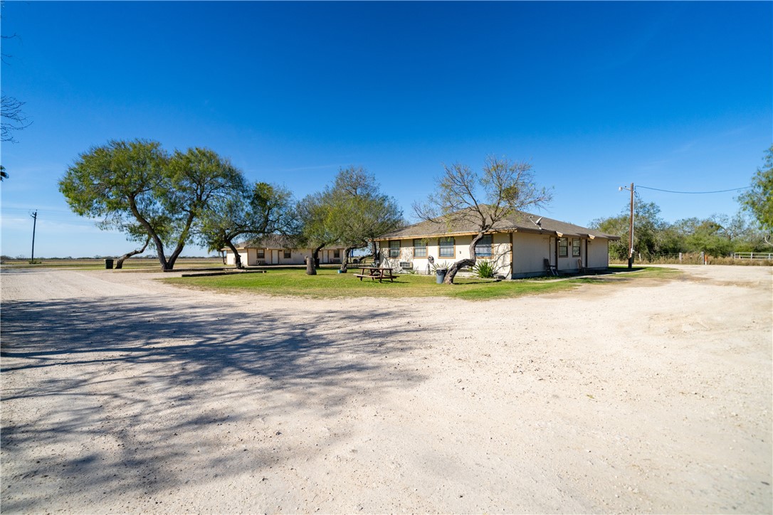 990 East Farm To Market 628 Riviera, TX 78379 - Photo 16 of 39 a view of a house with a yard and sitting area