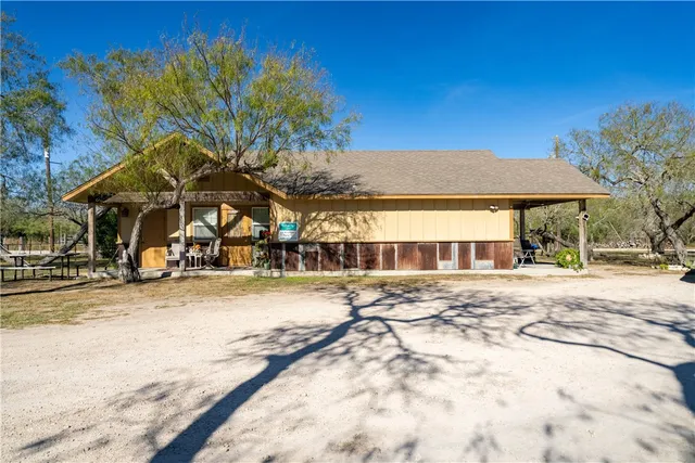 a view of a large space in front of a house