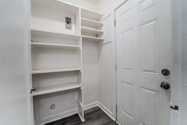 a view of an empty walk in closet