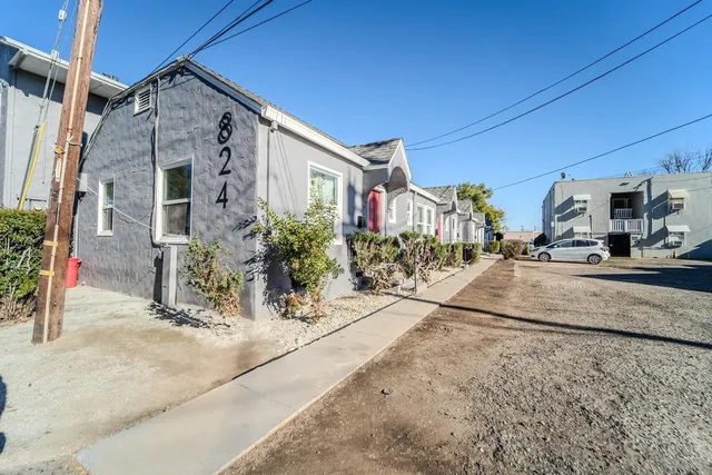 a view of a building with a street