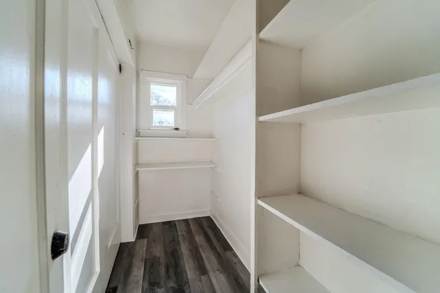 a view of an empty walk in closet