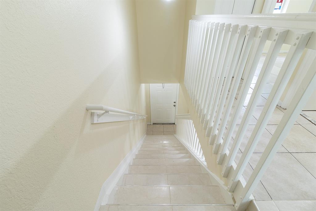 2214 Northwest 135th Terrace Opa-Locka, FL 33054 - Photo 22 of 29 a view of a hallway with stairs