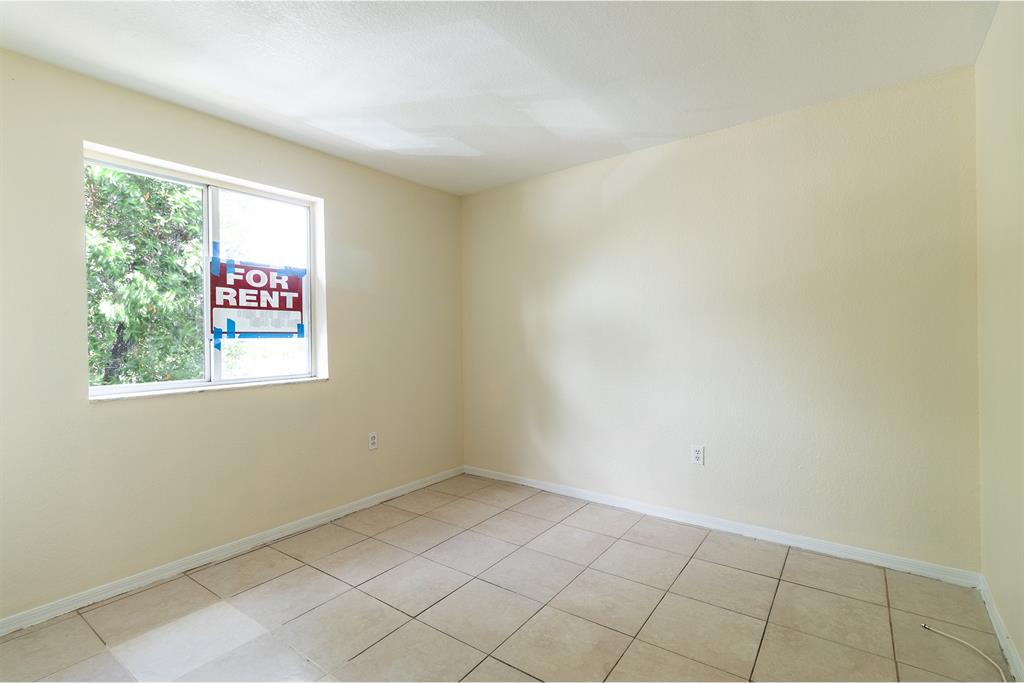 2214 Northwest 135th Terrace Opa-Locka, FL 33054 - Photo 25 of 29 a view of an empty room with window