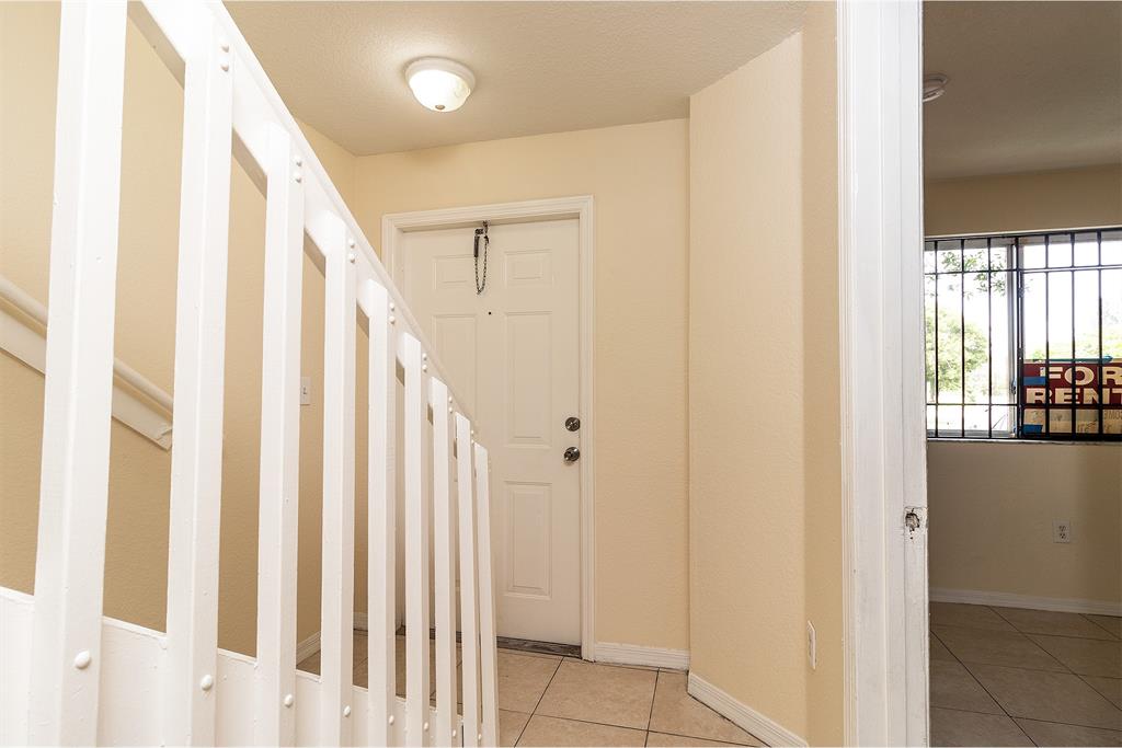 2214 Northwest 135th Terrace Opa-Locka, FL 33054 - Photo 3 of 29 a view of wooden floor with staircase