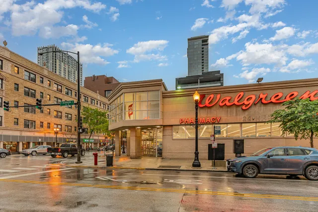 a view of a street with cars