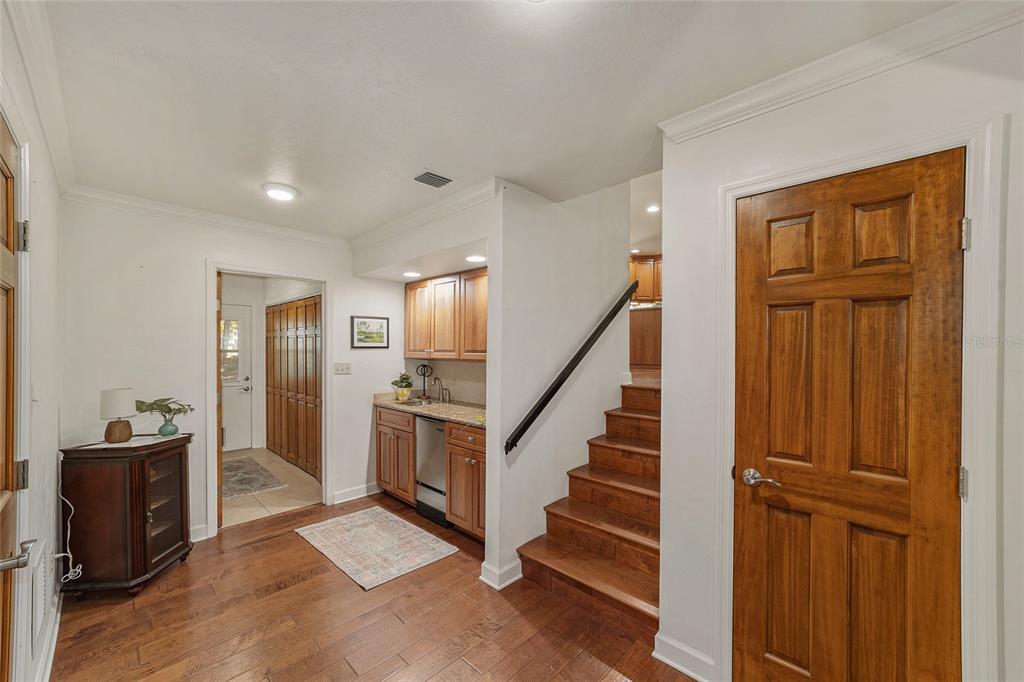 6015 Southwest 36th Way Gainesville, FL 32608 - Photo 15 of 67 a view of a hallway with furniture and entryway