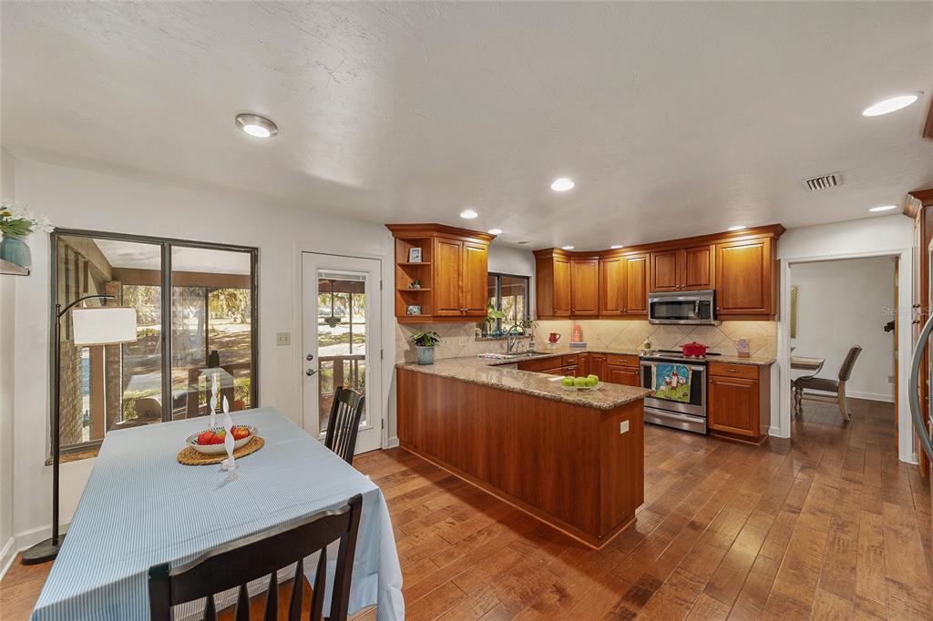 6015 Southwest 36th Way Gainesville, FL 32608 - Photo 29 of 67 a kitchen with lots of counter top space