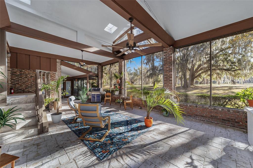 6015 Southwest 36th Way Gainesville, FL 32608 - Photo 3 of 67 a living room filled with furniture