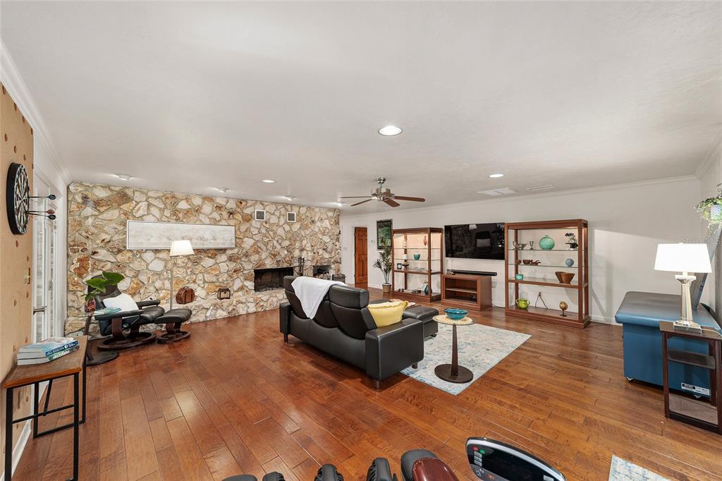 6015 Southwest 36th Way Gainesville, FL 32608 - Photo 33 of 67 a living room with furniture and a large window