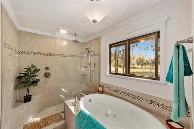 a building outdoor space with patio furniture and potted plants