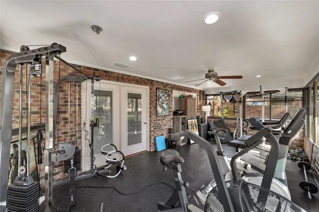 a view of dirt yard with large trees