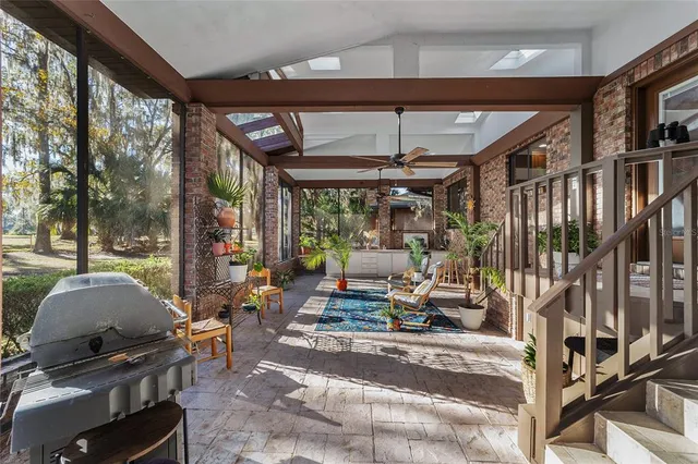 a view of a yard with a tree