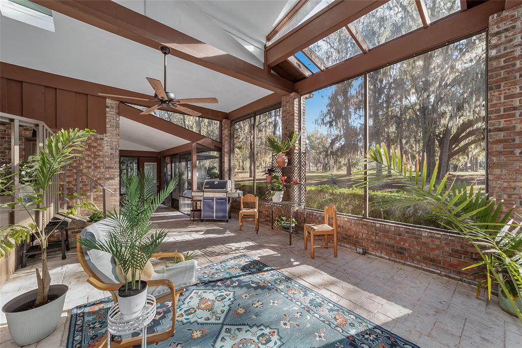 6015 Southwest 36th Way Gainesville, FL 32608 - Photo 50 of 67 a building outdoor space with patio furniture and potted plants