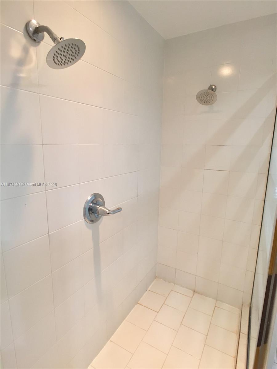 1025 Alton Road, Unit 507 Miami Beach, FL 33139 - Photo 15 of 28 a bathroom with a shower