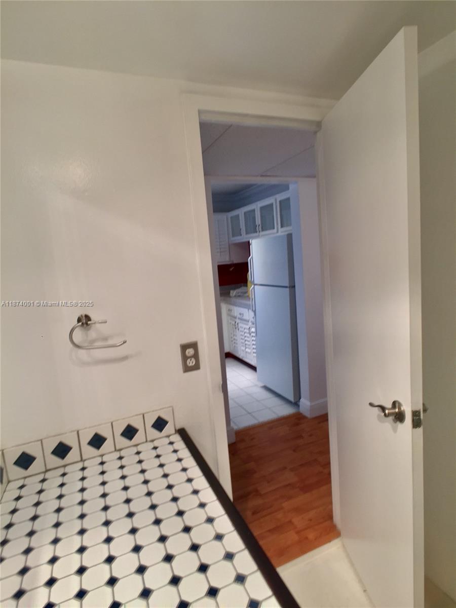 1025 Alton Road, Unit 507 Miami Beach, FL 33139 - Photo 18 of 28 a bathroom with a bathtub and shower