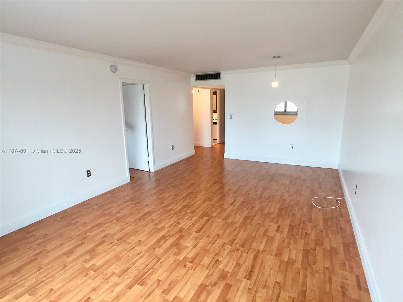 1025 Alton Road, Unit 507 Miami Beach, FL 33139 - Photo 20 of 28 wooden floor in an empty room