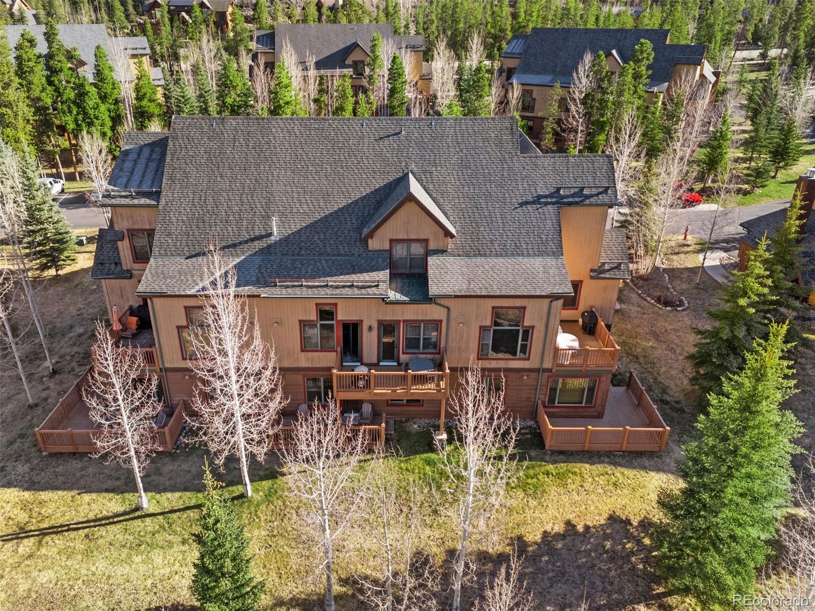 88 Hawk Circle, Unit 2349 Dillon, CO 80435 - Photo 18 of 26 an aerial view of a house with swimming pool and a yard