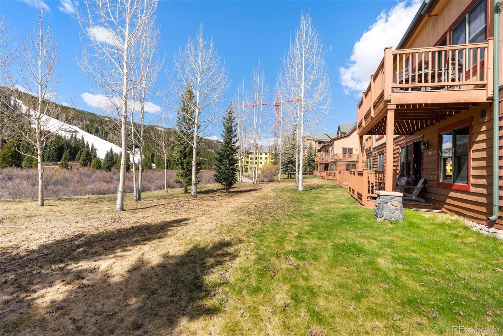 88 Hawk Circle, Unit 2349 Dillon, CO 80435 - Photo 25 of 26 a view of a house with a yard and sitting area