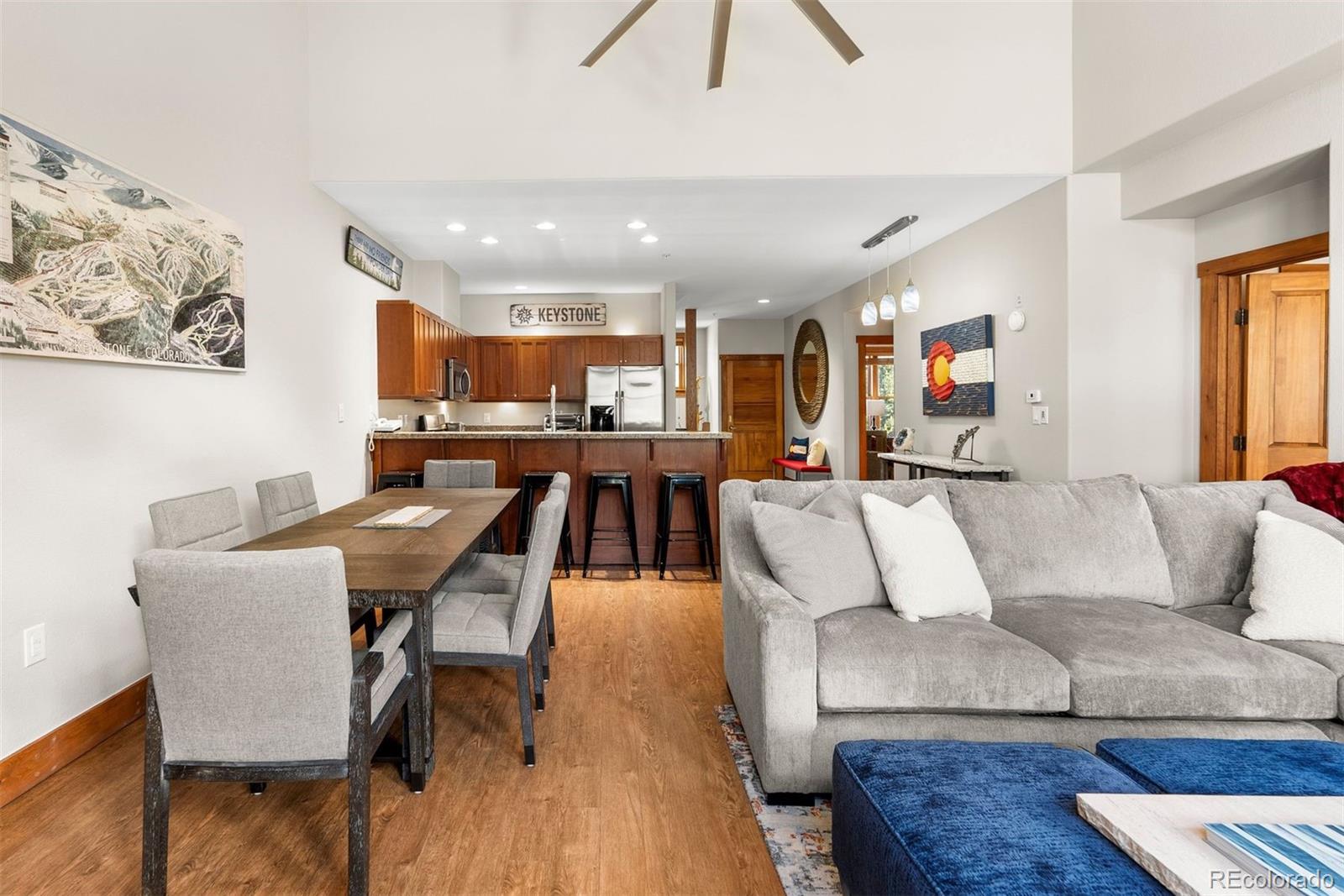 88 Hawk Circle, Unit 2349 Dillon, CO 80435 - Photo 3 of 26 a living room with furniture kitchen view and a wooden floor