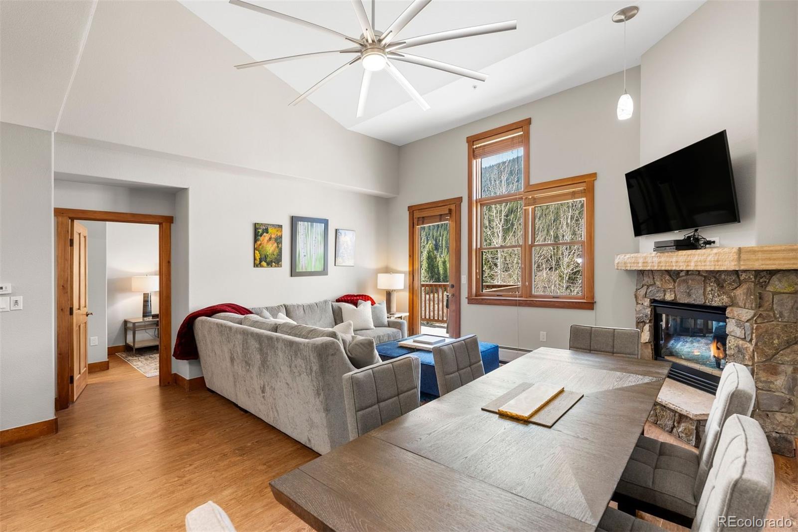 88 Hawk Circle, Unit 2349 Dillon, CO 80435 - Photo 4 of 26 a living room with furniture fireplace and flat screen tv