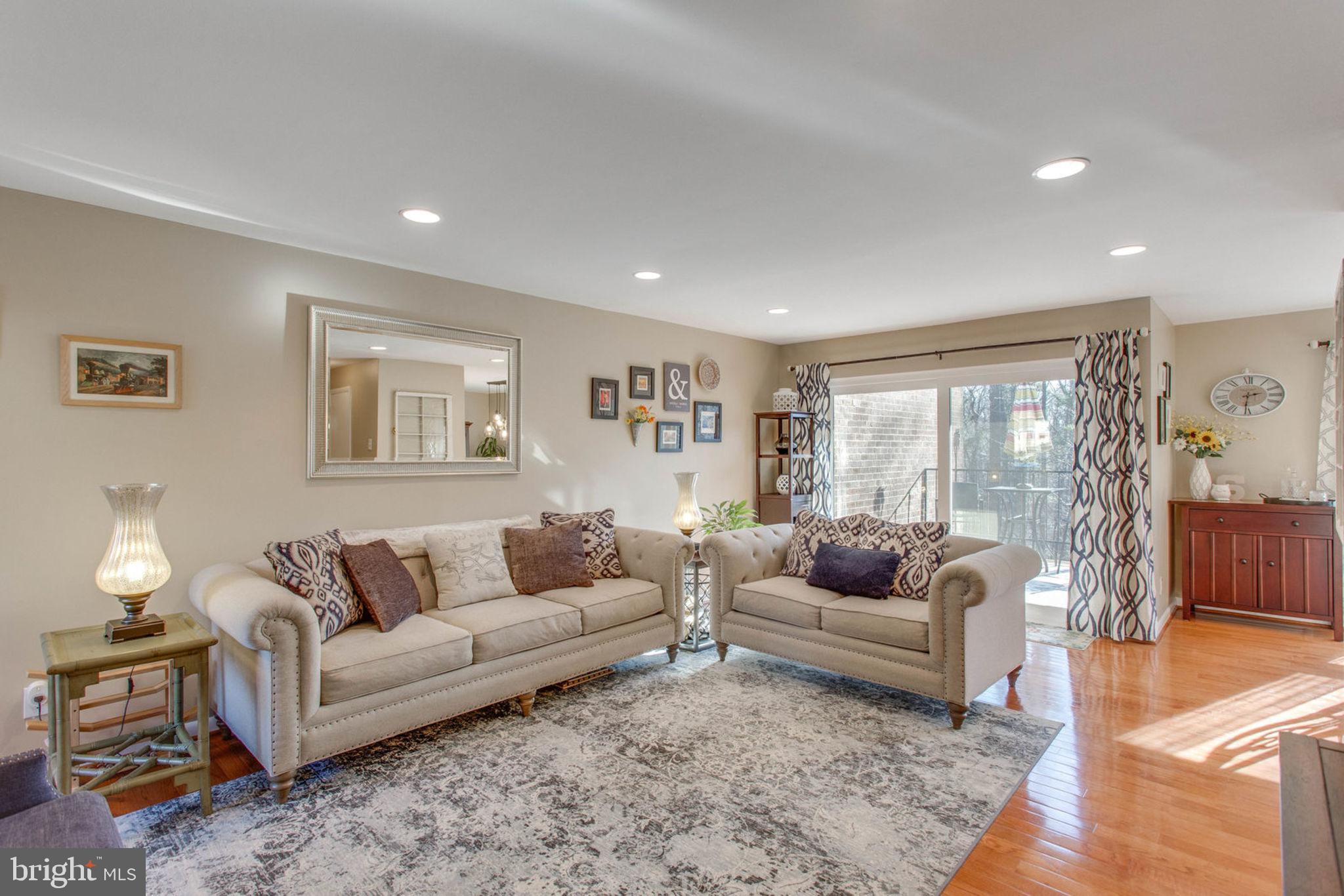 An inviting Sun kissed living room as you walk in.