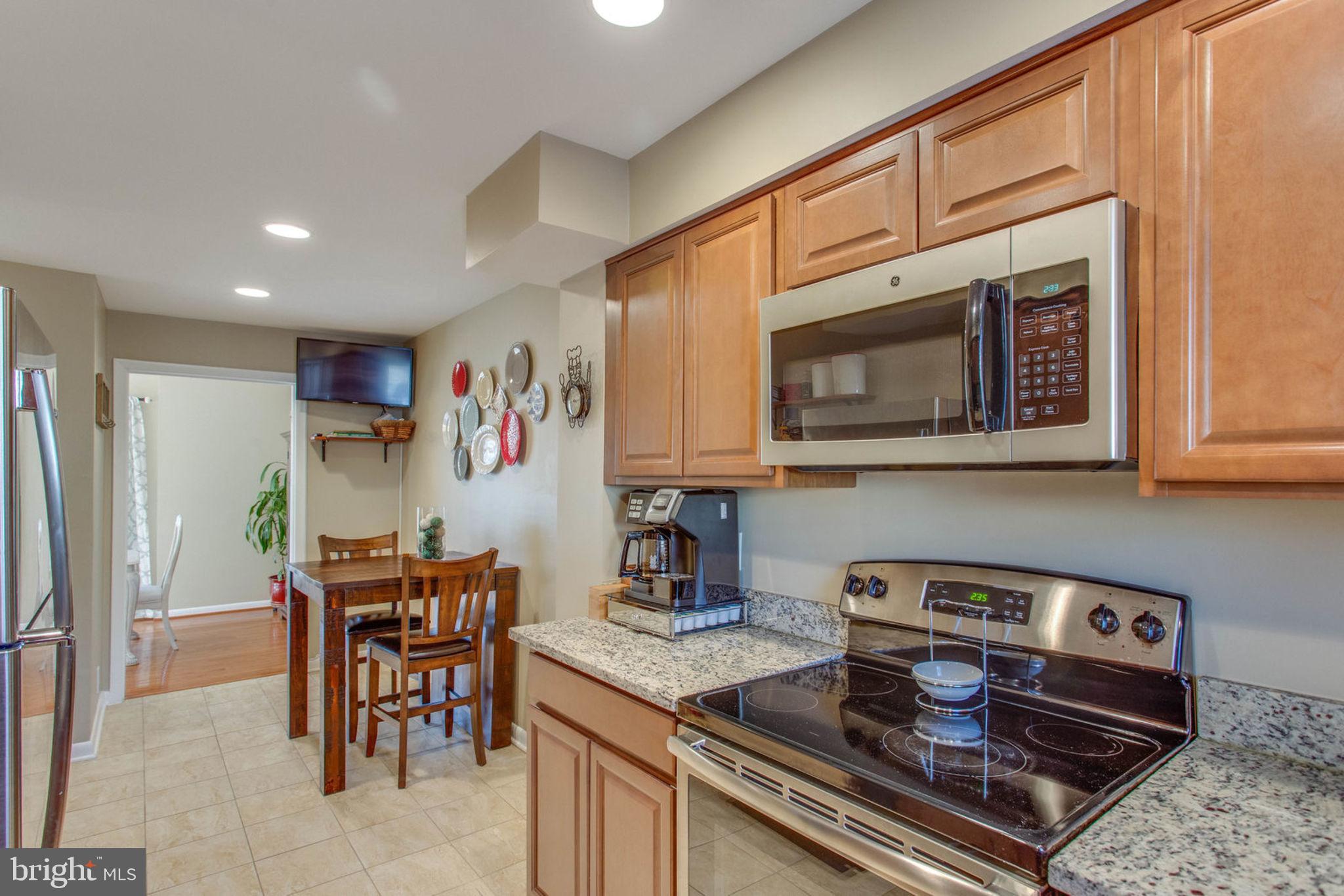 11069 Saffold Way Reston, VA 20190 - Photo 14 of 66 Granite, SS appliances