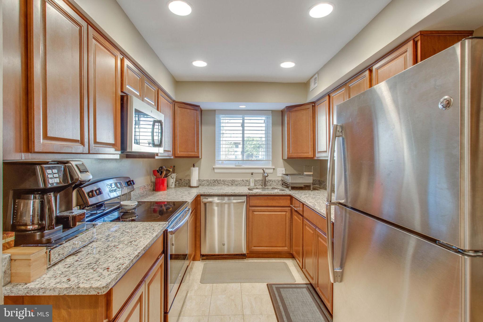 11069 Saffold Way Reston, VA 20190 - Photo 15 of 66 Granite, SS appliances