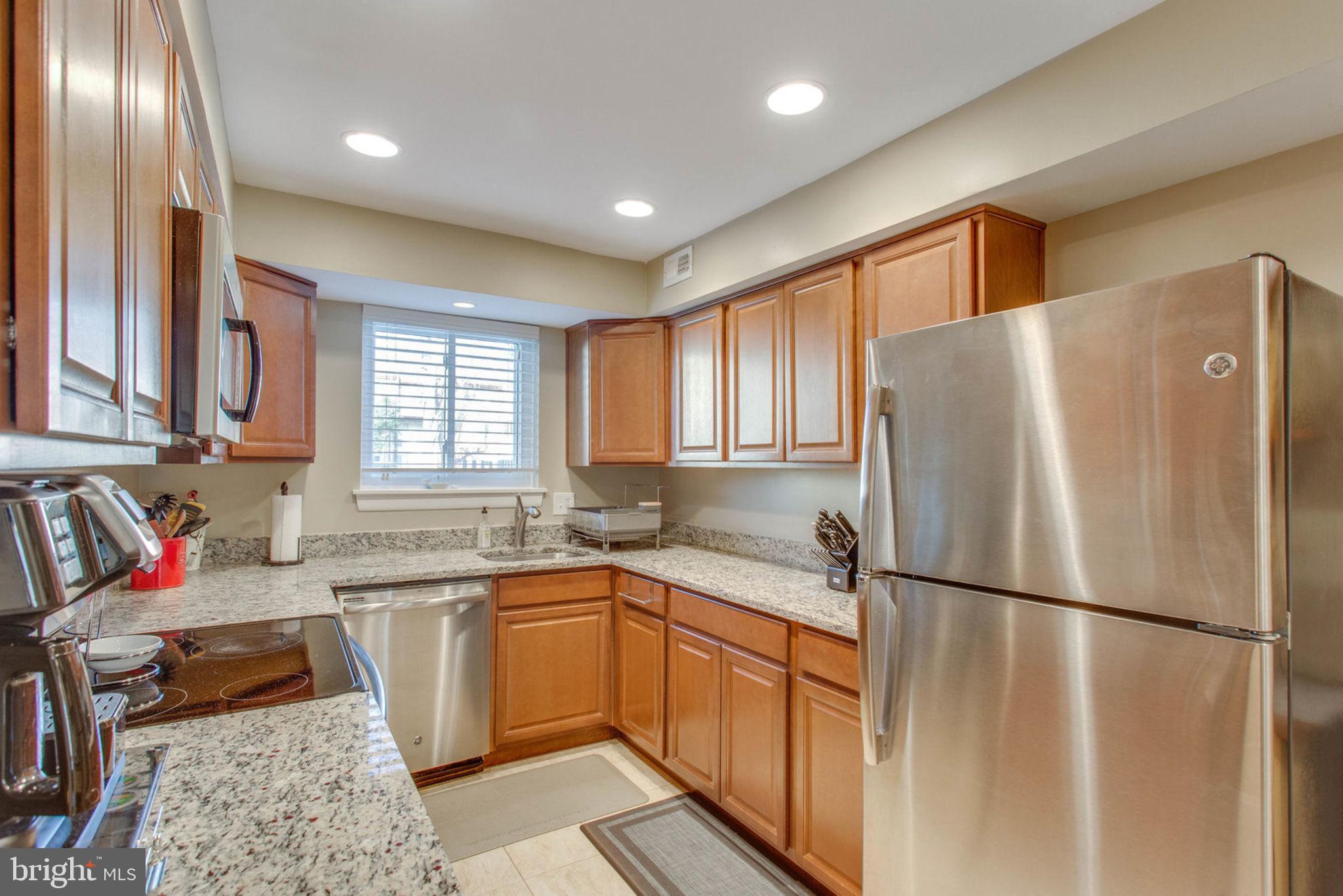 11069 Saffold Way Reston, VA 20190 - Photo 16 of 66 Granite, SS appliances