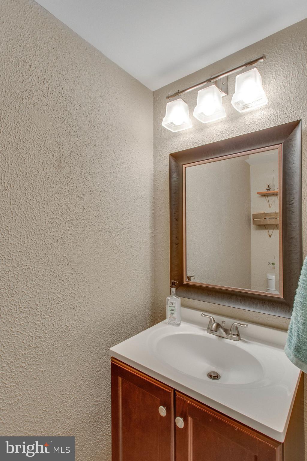 11069 Saffold Way Reston, VA 20190 - Photo 18 of 66 Powder room on Main level