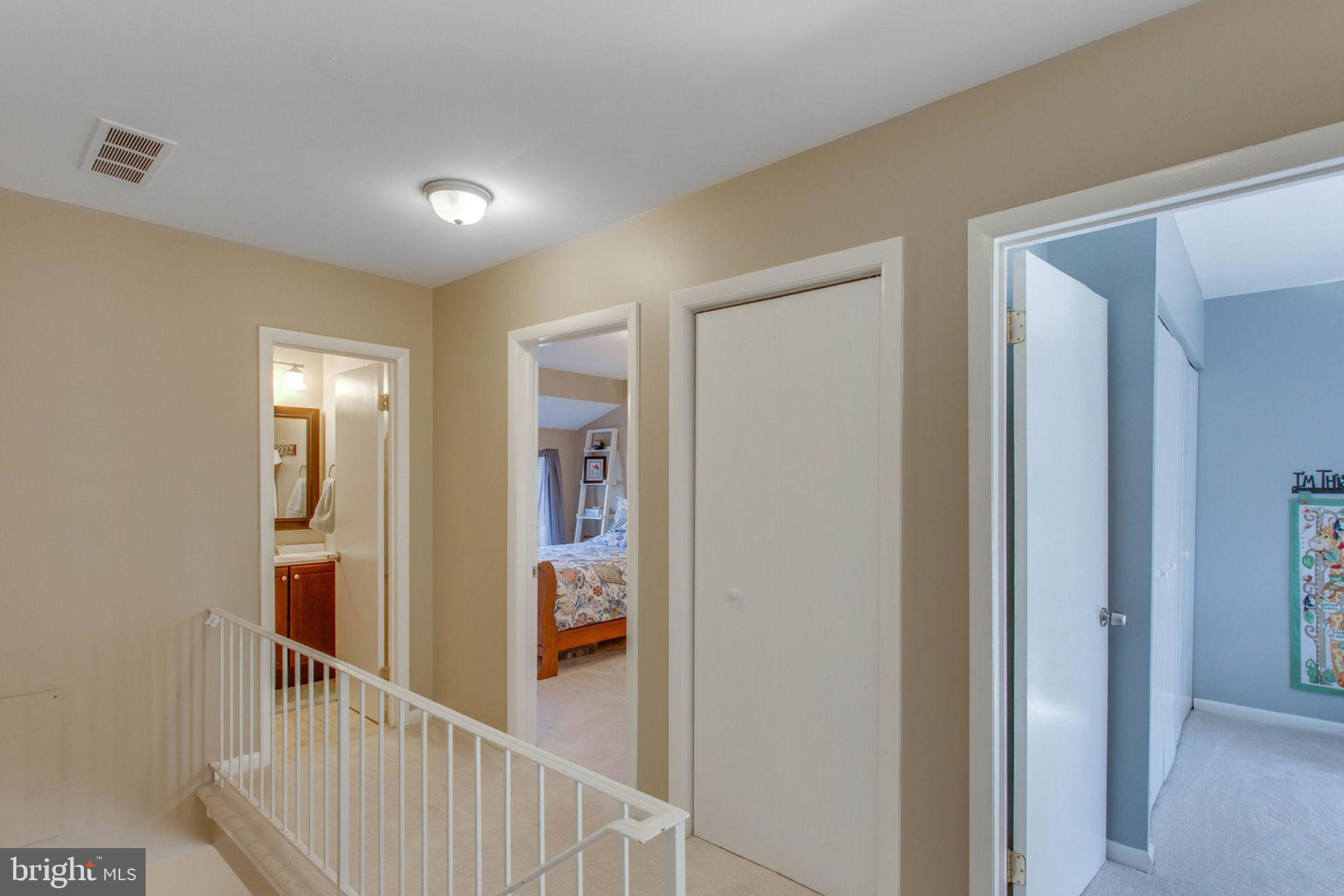11069 Saffold Way Reston, VA 20190 - Photo 35 of 66 Upstairs Hallway