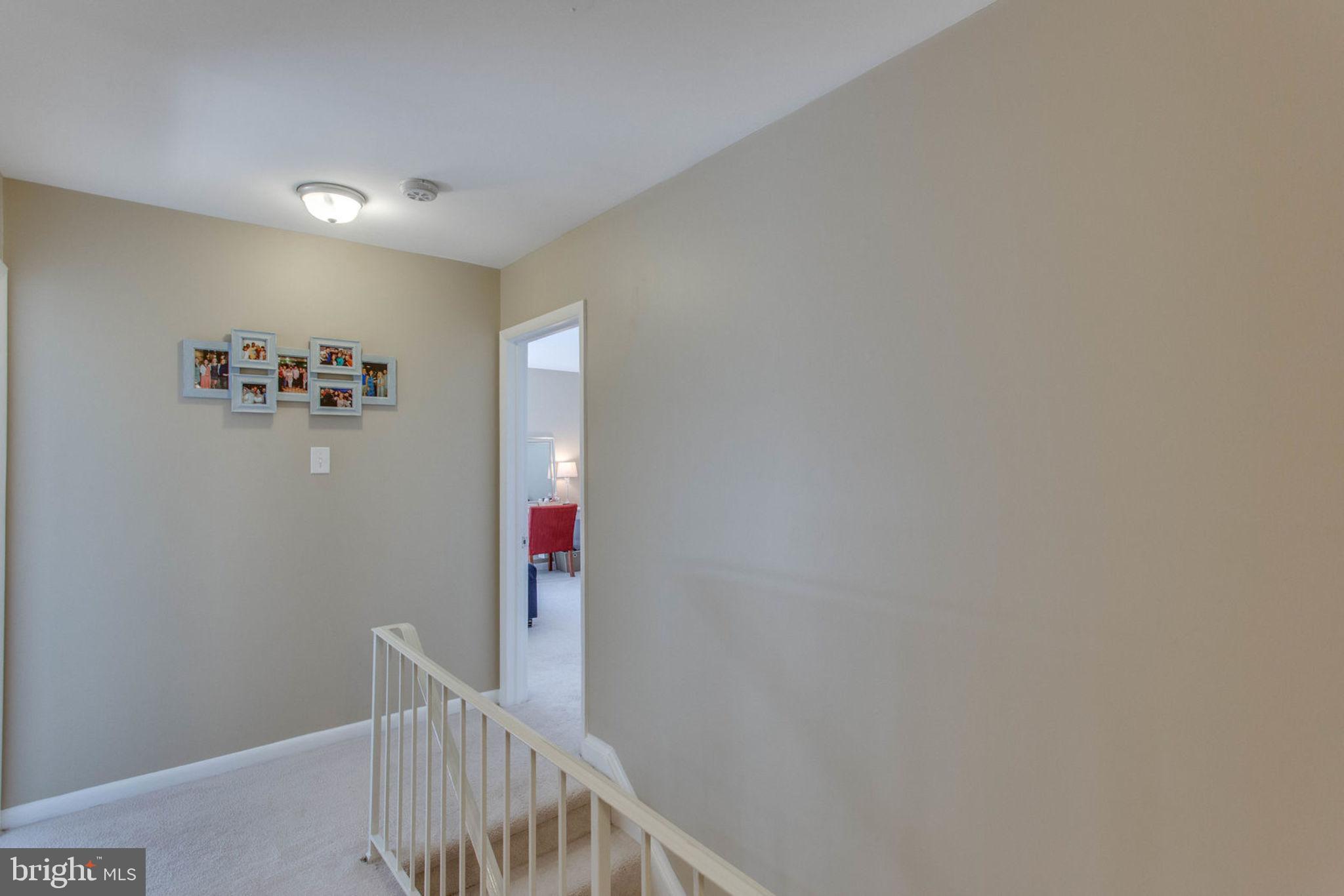 11069 Saffold Way Reston, VA 20190 - Photo 36 of 66 Upstairs Hallway