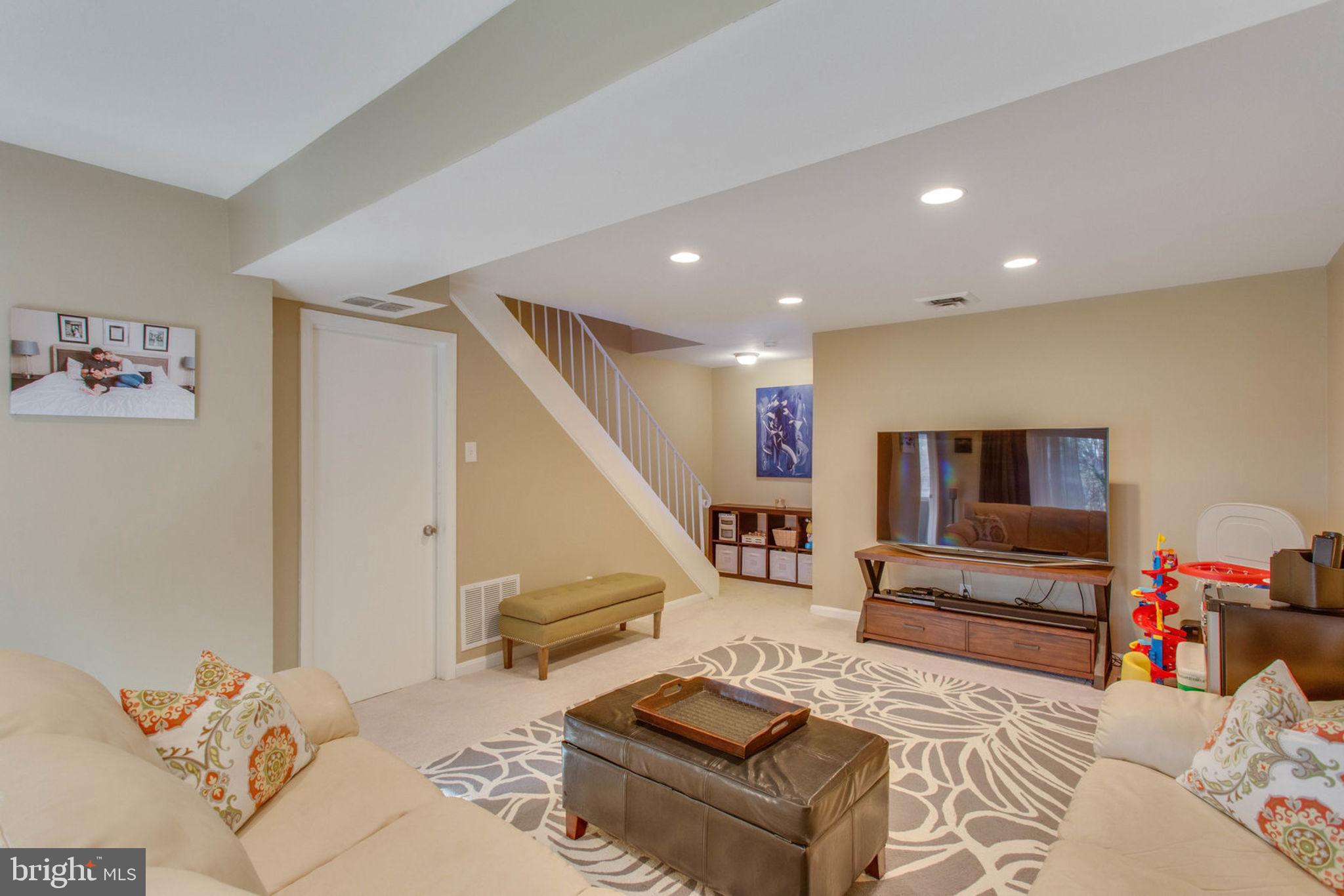 11069 Saffold Way Reston, VA 20190 - Photo 38 of 66 Lower Level Family Room