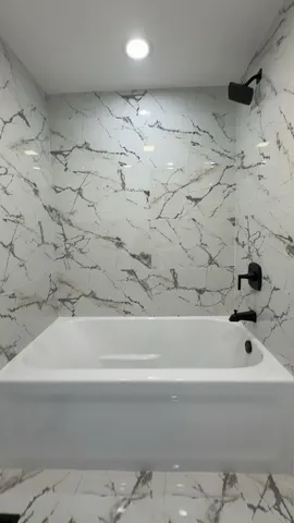 a bathroom with a bathtub