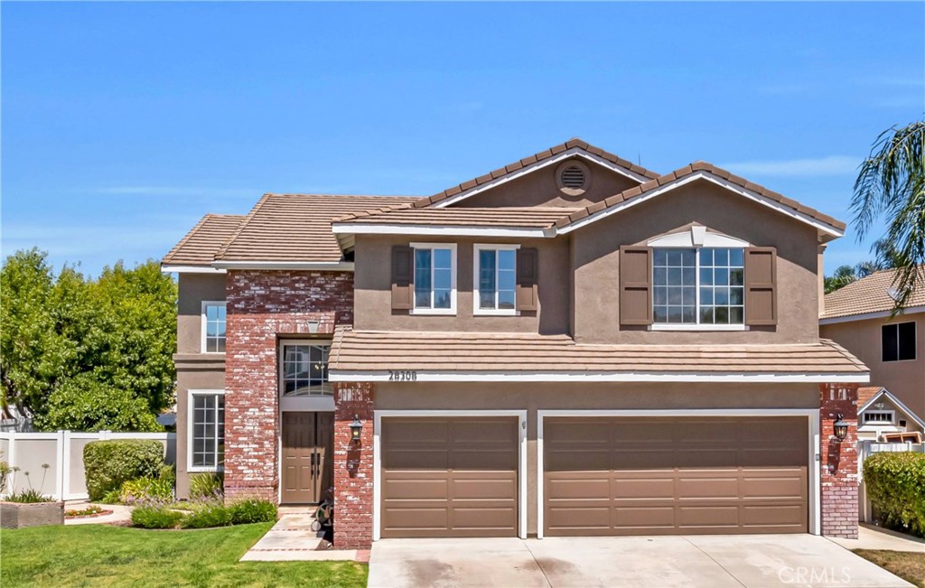 28308 Corte Ocaso Temecula, CA 92592 - Photo 1 of 43 a front view of a house with a yard