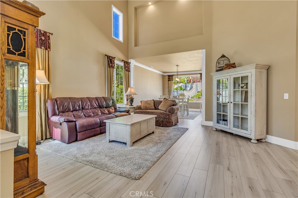 28308 Corte Ocaso Temecula, CA 92592 - Photo 12 of 43 a living room with furniture and a large window