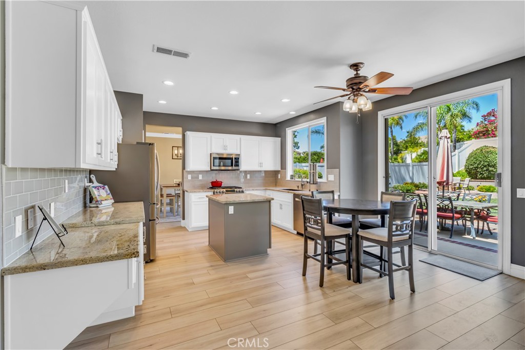 28308 Corte Ocaso Temecula, CA 92592 - Photo 17 of 43 a view of a dining room with furniture window and outside view