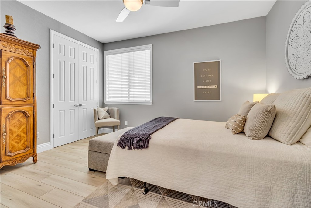 28308 Corte Ocaso Temecula, CA 92592 - Photo 21 of 43 a bedroom with a bed couch and next to a window